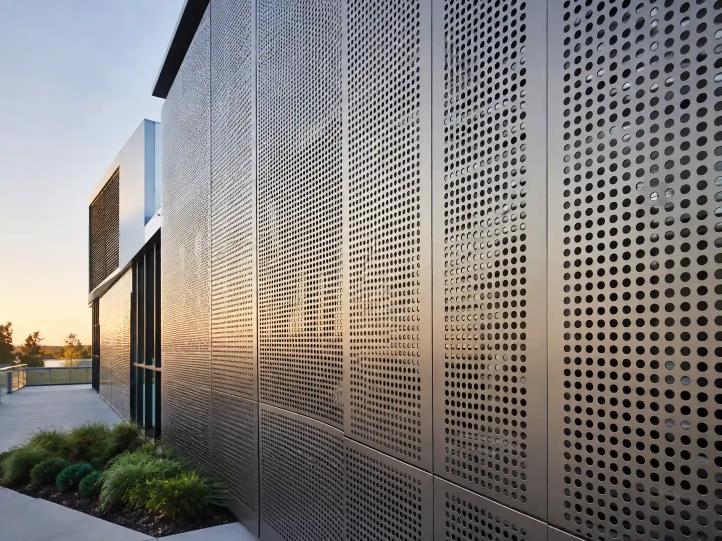 Architectural Perforated Metal Panels Architectural perforated metal panels installed on a modern building exterior for shading, ventilation and visual design