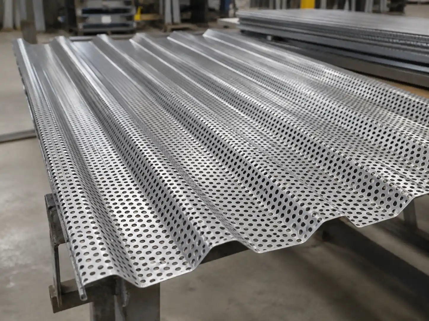 Corrugated Perforated Metal Panels Corrugated perforated metal panel with formed ribs and round holes for improved rigidity and airflow