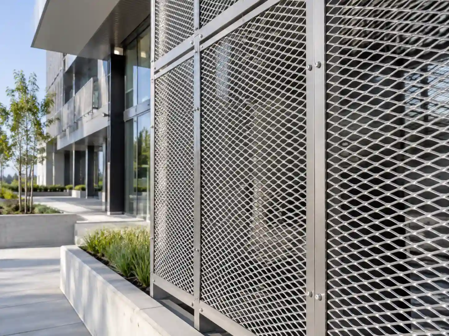 Stainless Steel Expanded Metal for Architectural Screening Stainless steel expanded metal panels used as exterior architectural screening on a modern building