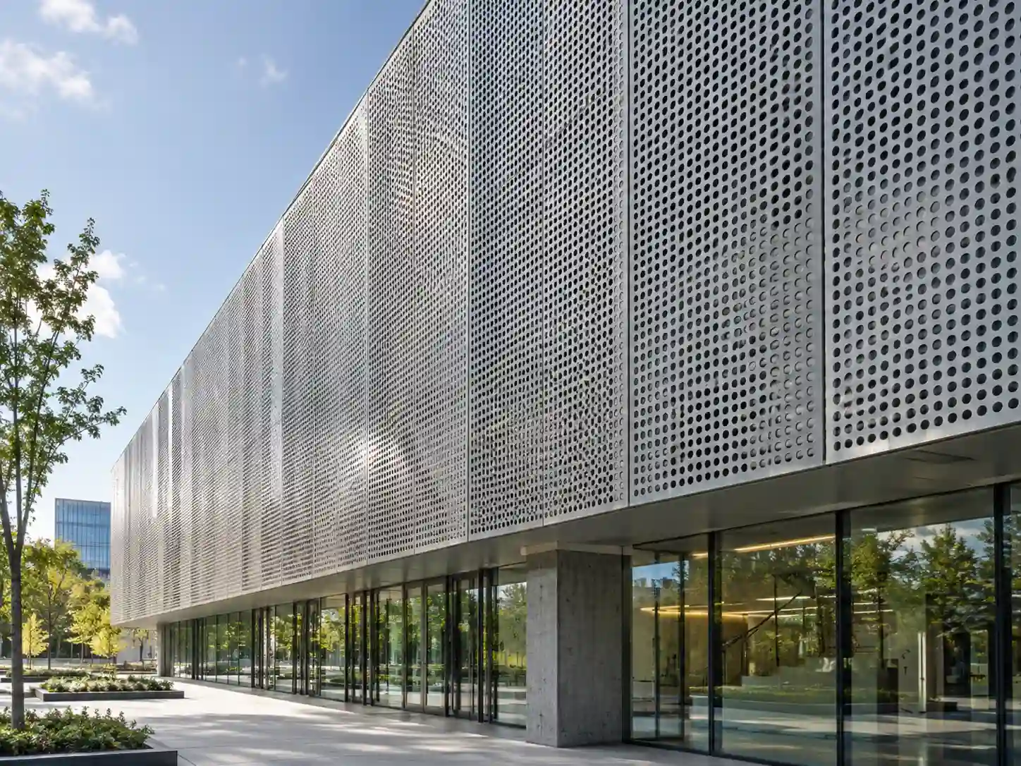 Stainless steel perforated metal panels used as architectural facade cladding on a modern building