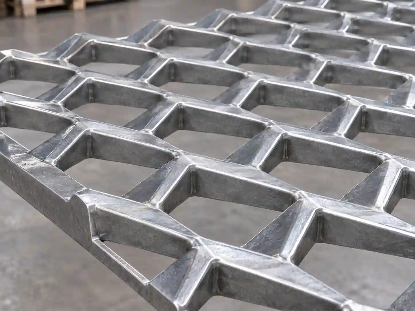 Standard Stainless Steel Expanded Metal Raised stainless steel expanded metal sheet showing a three-dimensional diamond mesh structure